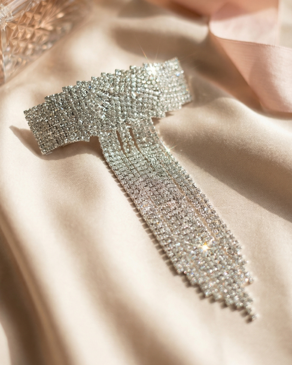 The Stardust rhinestone bow hair clip with crystal fringe — Pearls Glam Studio